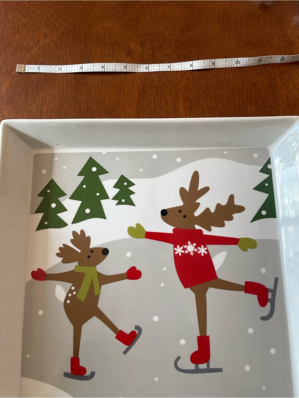 Crate&Barrel skating reindeer